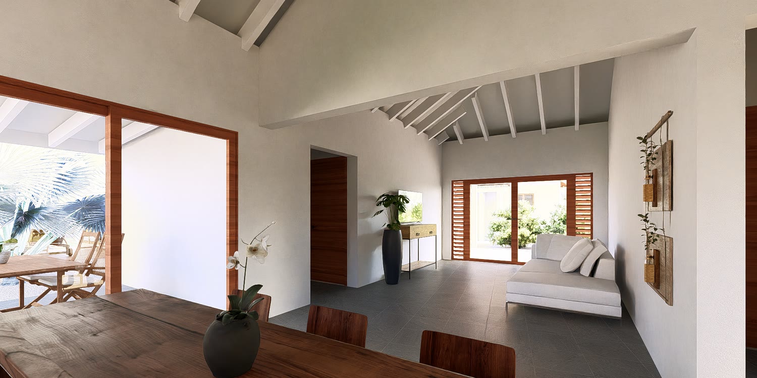 Living room with exposed white beams, dining table and sliding doors to the terrace