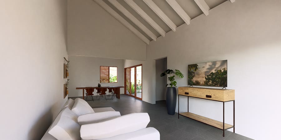 Seating area with white sofa and artwork