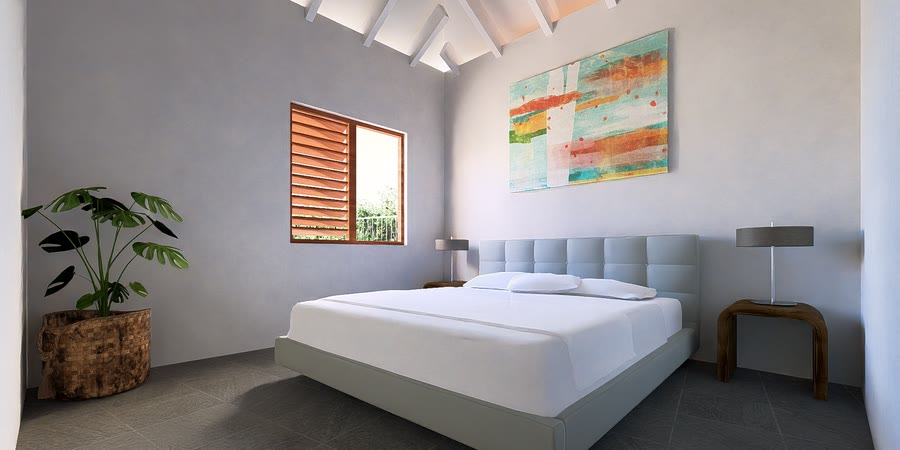 Second bedroom with artwork above the bed